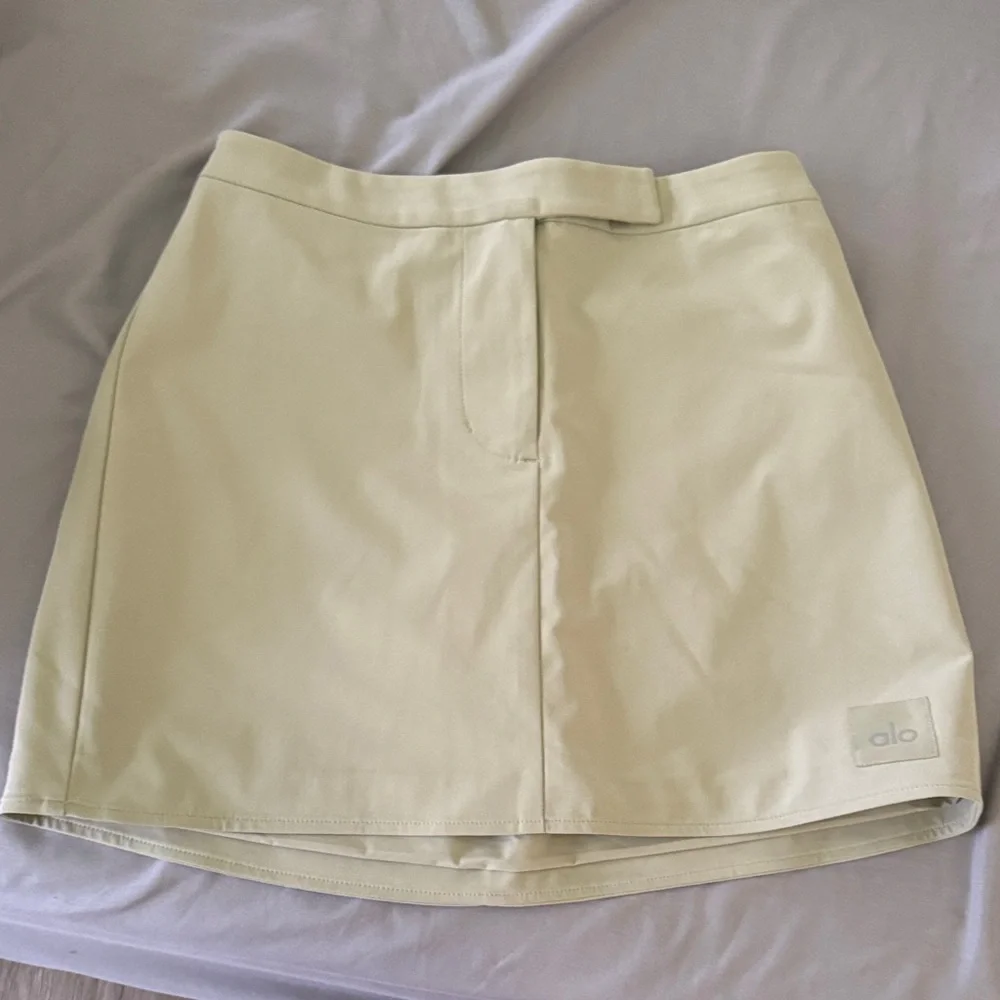 LIKE NEW ALO High Speed Mini Skirt, Limestone, size XS